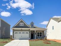 Charming one-story home with a well-manicured lawn and a two-car garage at 116 Asher Dr, Carrollton, GA 30116