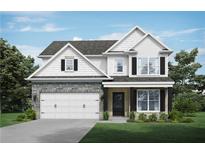 Charming two-story home featuring a stone facade, white siding, black shutters, and a manicured lawn at 3856 Lockaby Way, Lawrenceville, GA 30044