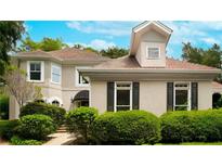 Charming home exterior featuring manicured landscaping and classic architectural details at 3655 Brisbane Dr, Marietta, GA 30062