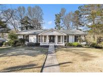 Charming one-story home featuring a lovely front porch and walkway at 4433 Canary Ct, Lithia Springs, GA 30122