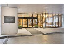 Modern building entrance featuring glass walls and automatic doors, showcasing sleek design and accessibility at 145 15Th Ne St # 204, Atlanta, GA 30309