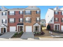 Charming brick townhome with well-maintained landscaping and attached garage at 3540 Chattahoochee Summit Se Ln # 28, Atlanta, GA 30339