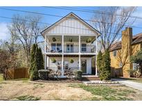 Charming two-story home with double porches and well-manicured landscaping at 2531 Paul Nw Ave, Atlanta, GA 30318