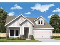 Charming home with a stone accent and a well-manicured lawn, perfect for curb appeal at 2055 Ripple Park Bend, Canton, GA 30114
