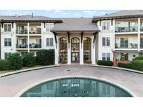Beautiful condominium exterior showcasing balconies and manicured landscaping at 3101 Howell Mill Nw Rd # 201, Atlanta, GA 30327