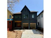 New construction showing a charming two-story home with a two-car garage at 2591 Apple Valley Rd, Brookhaven, GA 30319