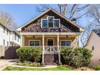 Charming home featuring a welcoming front porch and craftsman-style details at 2628 White Oak Dr, Decatur, GA 30032