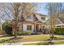 Charming two-story home with well-maintained lawn and inviting front porch in a desirable neighborhood at 2091 Mclendon Ne Ave, Atlanta, GA 30307