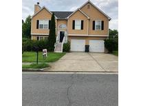 Two-story home with neutral siding, black shutters, well-maintained landscaping, and a two-car garage at 4528 Baker Grove Nw Rd, Acworth, GA 30101