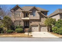 Beautiful brick home with a well-maintained front yard and a two-car garage at 4022 Newhaven Ne Cir, Brookhaven, GA 30319