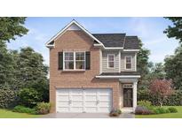 Charming two-story home with brick facade, attached garage, and professionally landscaped front yard at 12110 Conrad Circle, Hampton, GA 30228
