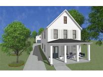 Charming two-story home featuring a covered porch, swing, and a well-maintained front yard with mature trees at 1091 Birch Sw St, Atlanta, GA 30310