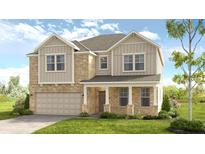 Charming two-story home with a neutral color palette, well-manicured lawn, and inviting front porch at 3048 Shirecrest Ln, Dacula, GA 30019