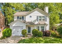 Charming two-story home with manicured lawn and inviting curb appeal in a desirable neighborhood at 1123 Seaboard Nw Ave, Atlanta, GA 30318