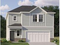 Charming two-story home with light gray siding, a white garage door and lush green landscaping at 321 Daybreak Dr, Acworth, GA 30102