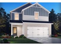 Charming two-story home featuring light brick, light gray siding, and a two-car garage at 2770 Aralynn Way, College Park, GA 30337
