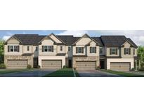 Charming townhome exteriors feature stone accents, neutral siding and attached garages at 4958 Jatoba Rd, Acworth, GA 30101