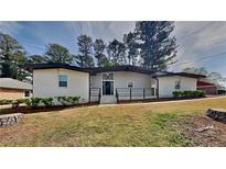 Charming single-story home with a well-manicured lawn and inviting curb appeal at 4193 Port Chester Way, Decatur, GA 30034