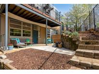 Cozy outdoor patio featuring comfortable seating and a dining area, perfect for relaxing and entertaining guests at 400 Village Ne Pkwy # 203, Atlanta, GA 30306