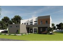 Modern two-story home showcasing unique architectural design and manicured front lawn at 360 Campground Road, Mcdonough, GA 30253