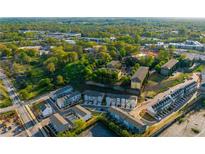 A high angle shot of the community with a variety of home styles and mature trees at 399 Skylar Way, Atlanta, GA 30315