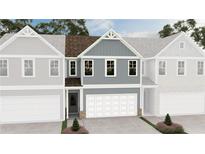 New construction townhome featuring blue siding, white trim, and a one-car garage at 6352 Towhee Way, Morrow, GA 30260