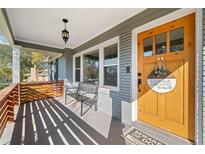 Inviting front porch with seating, decorative door, and stylish accents for a warm welcome at 2742 Oakland Ter, Decatur, GA 30032
