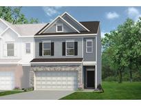 Charming two-story home with stone accents, gray siding, and a two-car garage at 1234 Ravencliff Dr # 157, Austell, GA 30168