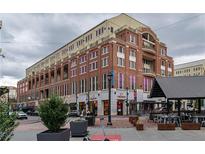 Brick apartment building featuring ground-level retail space in a vibrant urban setting at 264 19Th Nw St # 2308, Atlanta, GA 30363