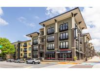 Modern apartment building boasts private balconies and street-level commercial space at 5300 Peachtree Rd # 3206, Atlanta, GA 30341