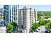 Upscale apartment building with a beautiful facade and balconies, showcasing city living at 2161 Peachtree Ne Rd # 907, Atlanta, GA 30309