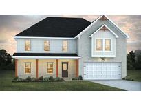 Charming two-story home with a brick facade, covered porch, and a two-car garage for convenient parking at 178 Orwell Dr, Social Circle, GA 30025