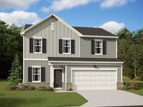Charming two-story home with gray siding, black shutters, and an attached two-car garage at 7771 Sudbury Cir, Covington, GA 30014
