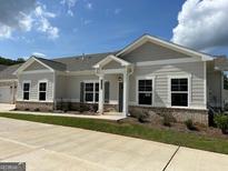 Beautiful single-story home with craftsman details and manicured landscaping at 3908 Shelleydale Dr, Powder Springs, GA 30127