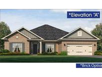 Charming brick home with a two-car garage and well-manicured lawn at 5007 Fairview Cir, Villa Rica, GA 30180
