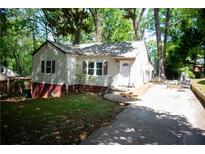 Charming single-story home with a well-maintained lawn and inviting curb appeal at 1774 Pennington Se Pl, Atlanta, GA 30316