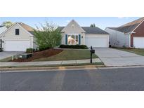 Charming single-Gathering home with well-manicured lawn and attached garage in quiet neighborhood at 3915 Deerborne Dr, Cumming, GA 30040