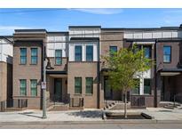 Modern brick townhome featuring a well manicured lawn and inviting front entrance at 2614 Talley St, Decatur, GA 30030
