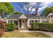 Charming single-story home with a manicured front yard and stone accents around the entrance at 1010 Eden Se Ave, Atlanta, GA 30316
