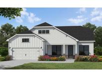 Charming two-story home featuring a symmetrical facade, attached garage, and professionally landscaped front yard at 341 Sobeck Way, Canton, GA 30115