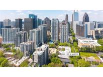 Stunning aerial view of city skyline showcasing 244 13th St Unit 310 and nearby Colony Square at 244 13Th Ne St # 310, Atlanta, GA 30309