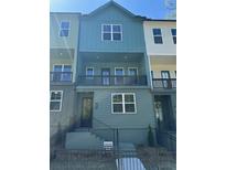 Two-story townhome with a modern design and a welcoming front porch at 1392 Cozy Circle # 349, Atlanta, GA 30315