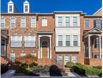 Charming brick townhouse with manicured landscaping and inviting entryway at 2775 Loftview Sq # 8, Atlanta, GA 30339