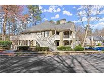 Charming multi-story condo with inviting front entrance and well-maintained landscaping at 208 Bainbridge Dr, Atlanta, GA 30327