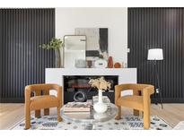 Cozy living room featuring a modern fireplace, stylish decor, and comfortable seating at 906 Mcdaniel St, Atlanta, GA 30310