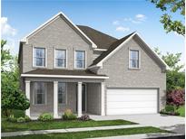 Charming two-story home with a welcoming front porch, neutral brick facade, and an attached two-car garage at 920 Melody Ridge Ln, Buford, GA 30518