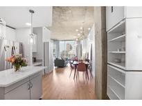 Bright condo featuring modern living space with open floor plan, city view and dining area at 860 Peachtree Ne St # 1103, Atlanta, GA 30308
