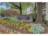 Community sign with beautiful landscaping at The Habersham of Buckhead private residences at 3655 Habersham Ne Rd # B-254, Atlanta, GA 30305