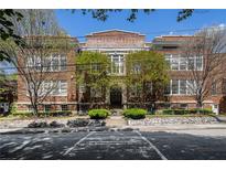 Brick building exterior showcases well maintained landscaping, front entry and historic design elements at 978 North Ne Ave # 207, Atlanta, GA 30306