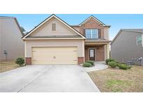 Charming two-story home with a two car garage and landscaped front yard at 4354 Favored Way, Union City, GA 30291